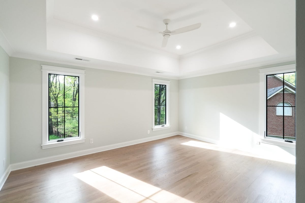 charlotte nc custom home primary bedroom hardwood floors