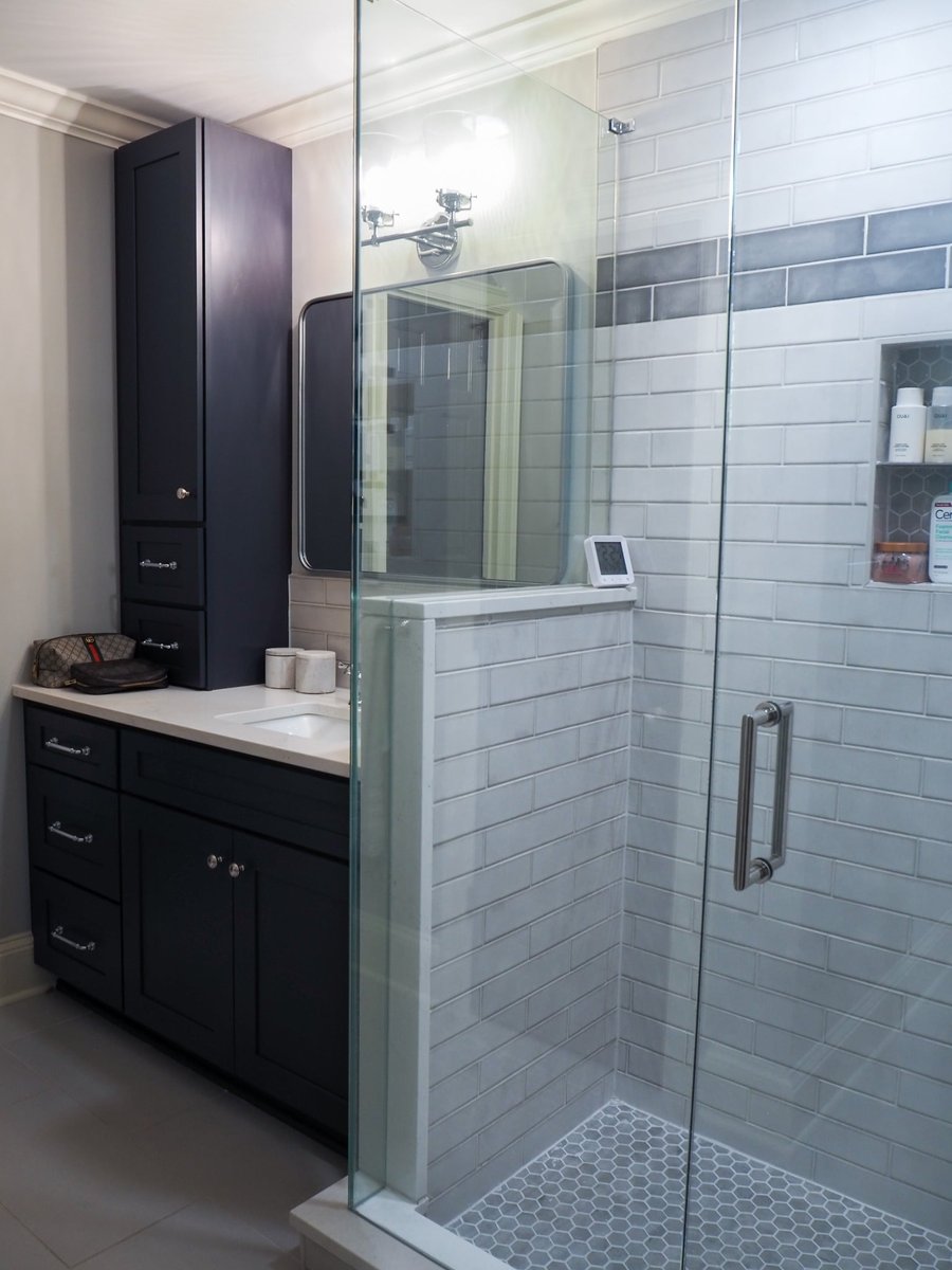 charlotte nc home project bathroom vanity beside glass shower with tiled half wall