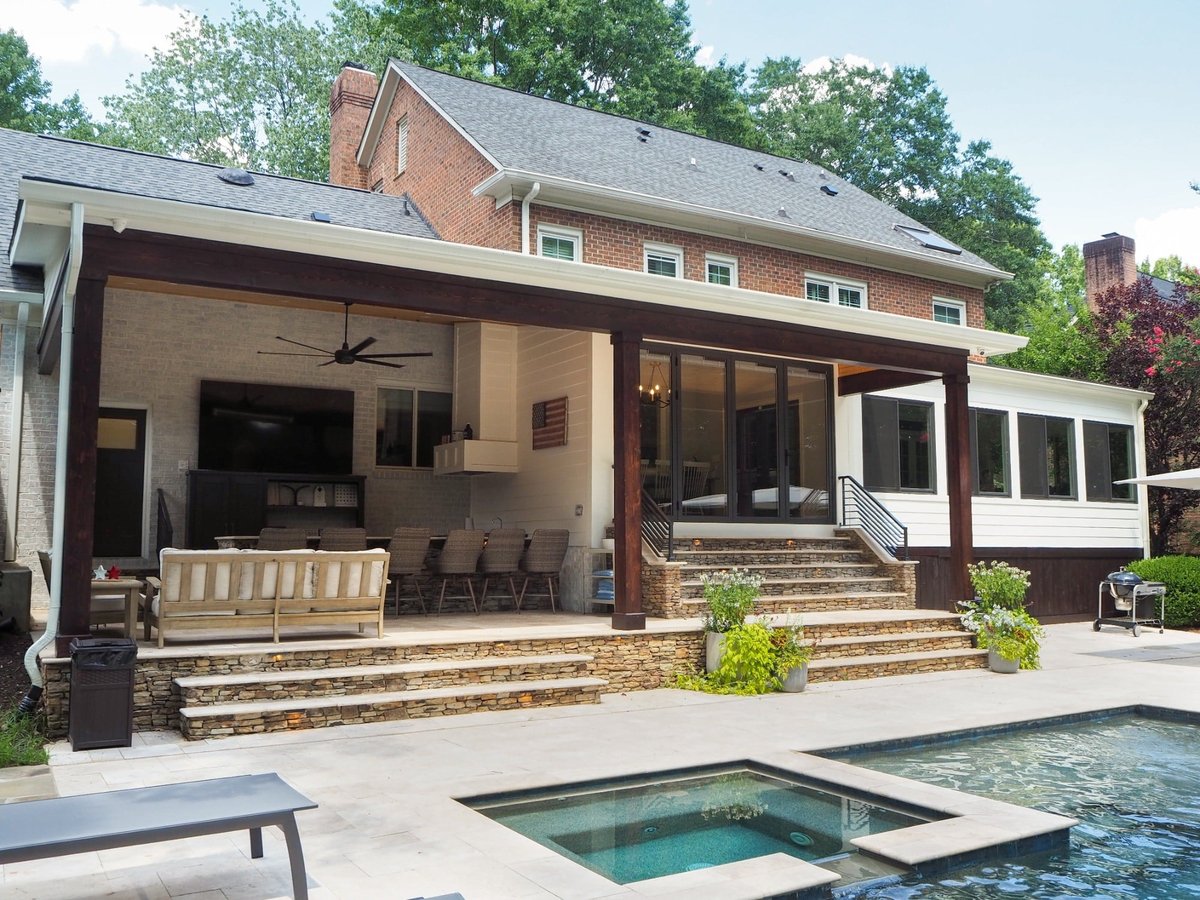 charlotte nc home project covered patio with outdoor dining stone steps screened room spa and pool