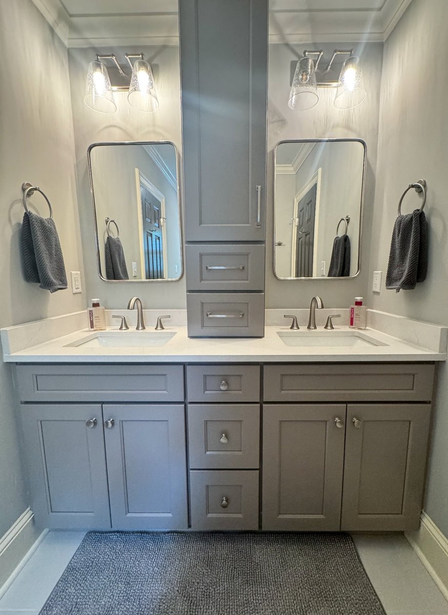 charlotte nc home project double sink bathroom vanity with gray cabinetry and center storage
