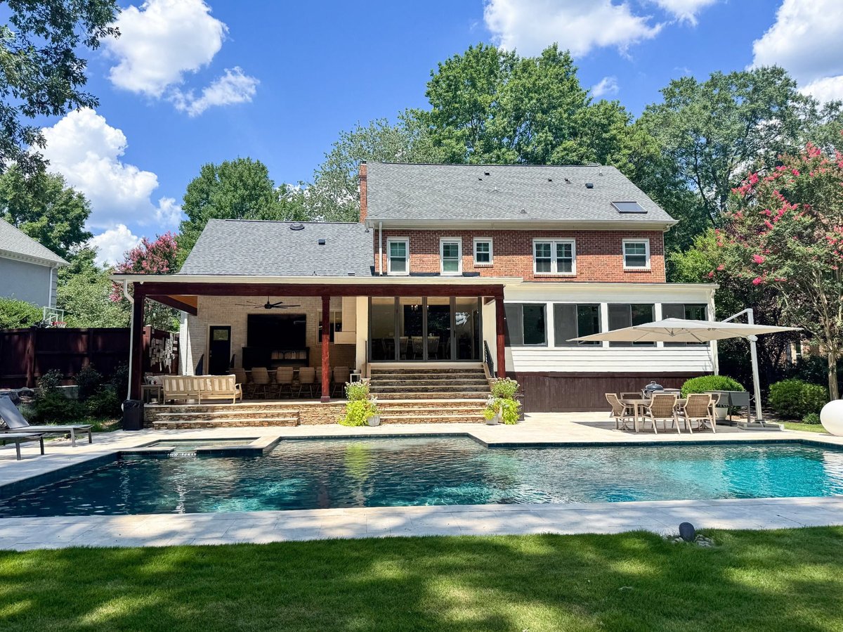charlotte nc home project pool and covered patio viewed from landscaped backyard