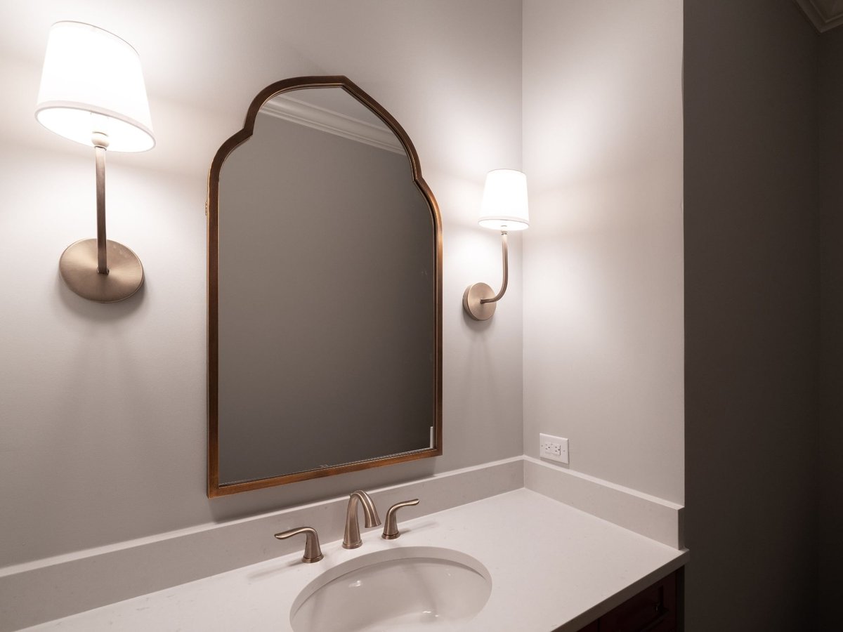 charlotte nc home project powder room sink with arched mirror and sconces