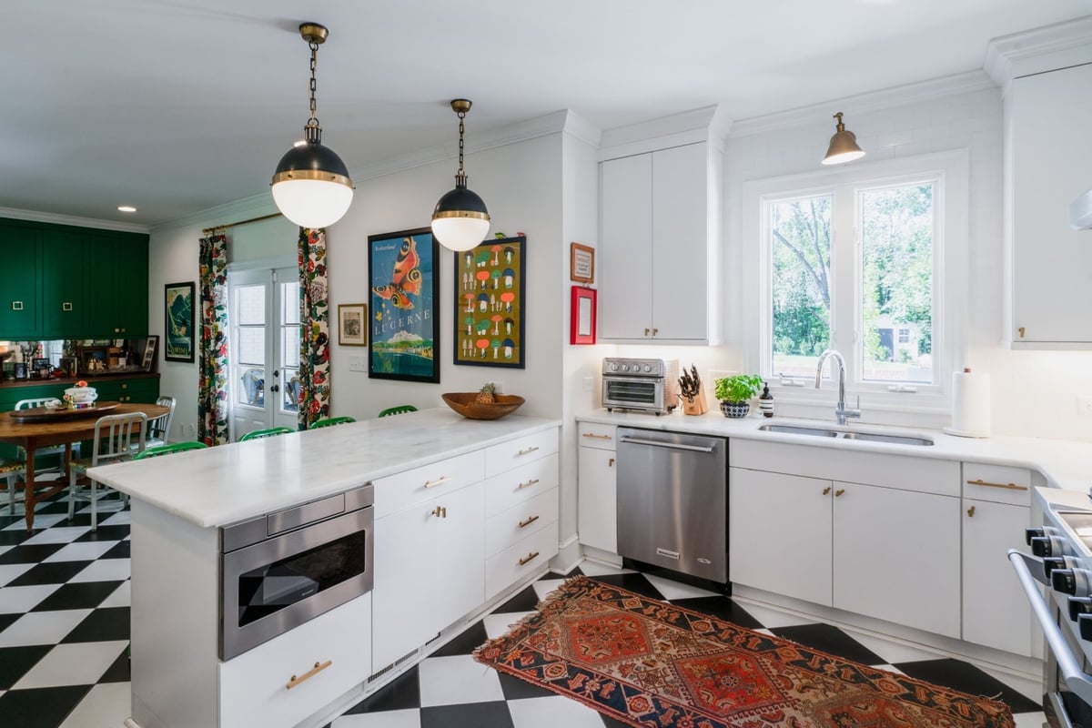 charlotte nc kitchen remodel with white cabinets marble island black and white checkerboard floor and pendant lights
