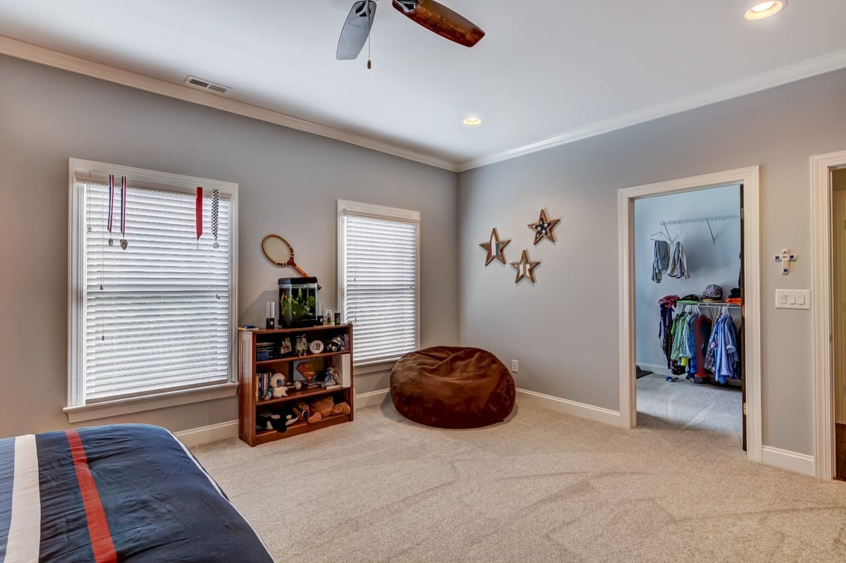 falcons themed bedroom with gray walls and large windows in charlotte nc whole home remodel