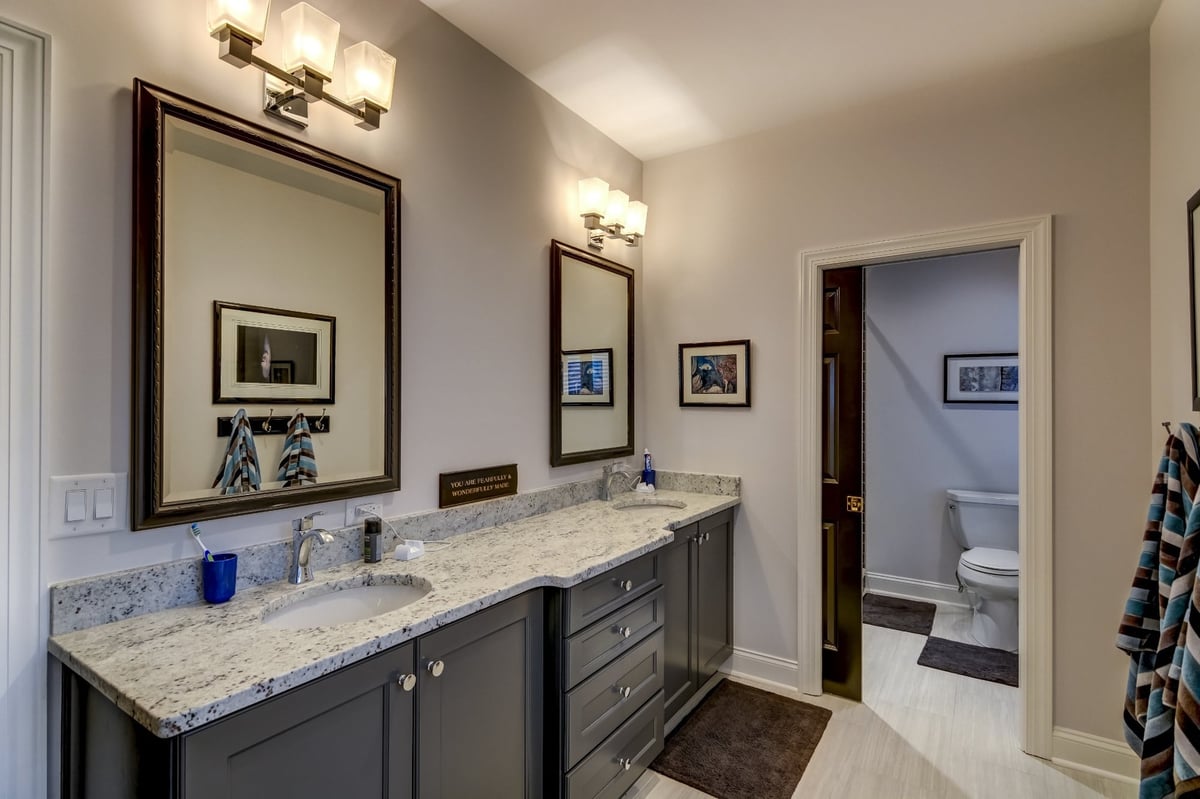 glass enclosed shower with dark subway tile in charlotte nc whole home remodel
