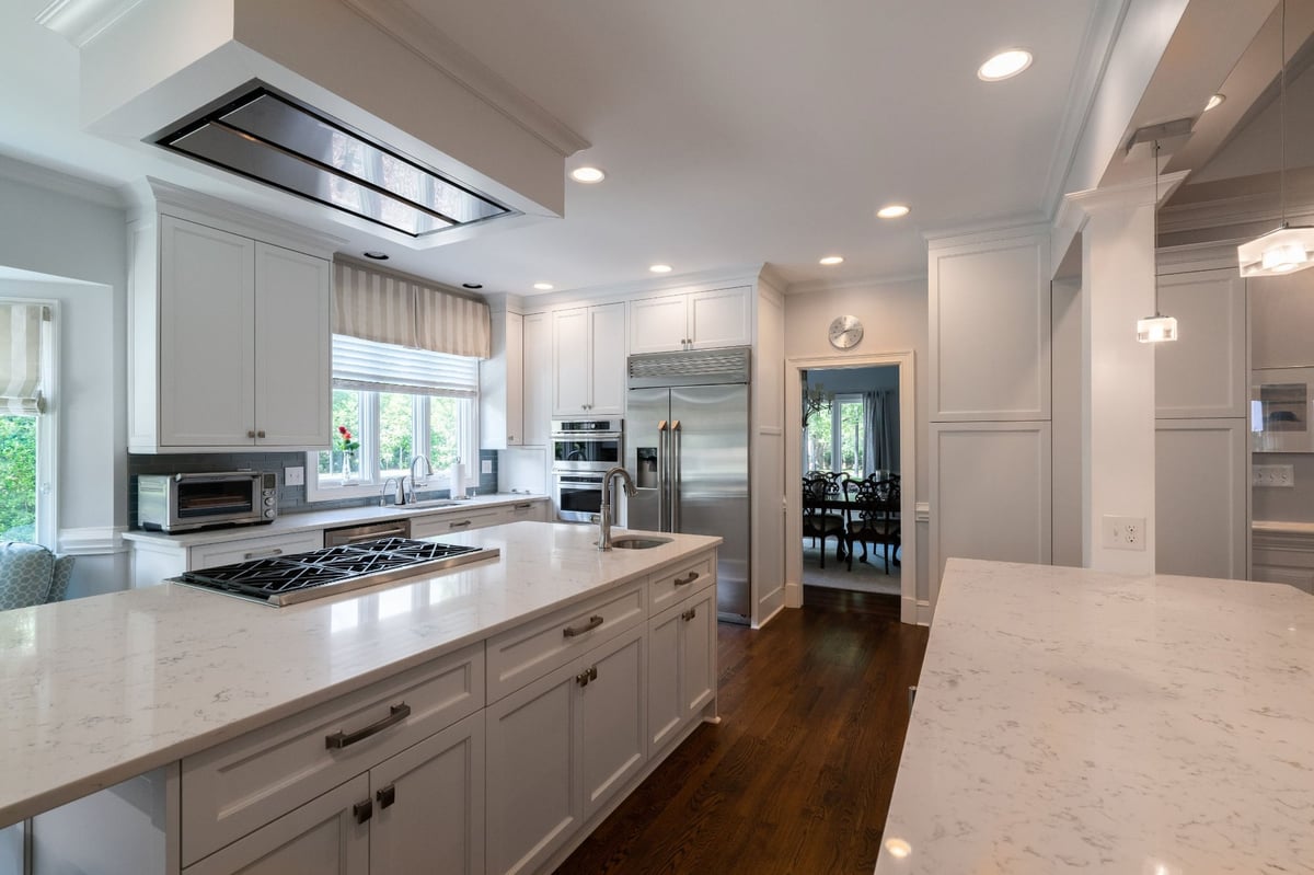 bright white kitchen with large island in charlotte nc first floor remodel
