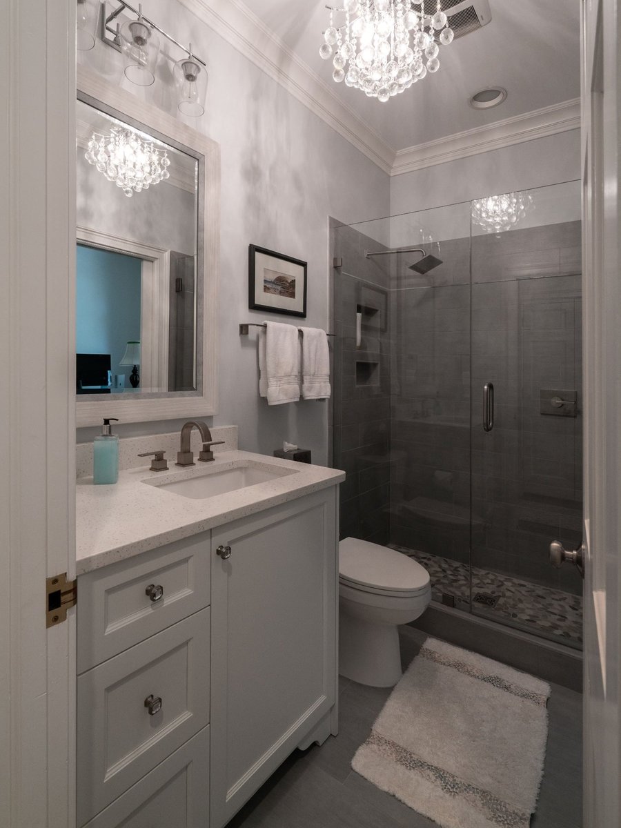 first floor remodel modern bathroom with glass shower in charlotte nc