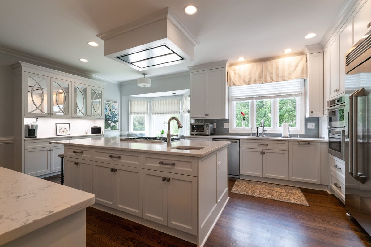white shaker kitchen with large island in charlotte nc first floor remodel