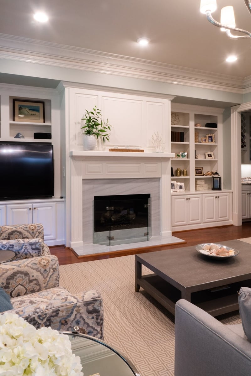 whole home remodel living room with fireplace built ins and neutral furnishings in charlotte nc