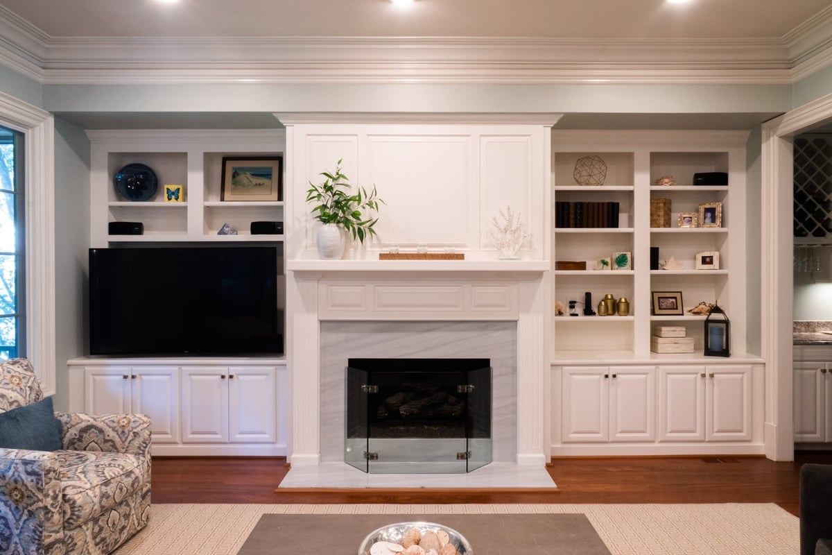 whole home remodel living room with fireplace custom built ins and seating in charlotte nc