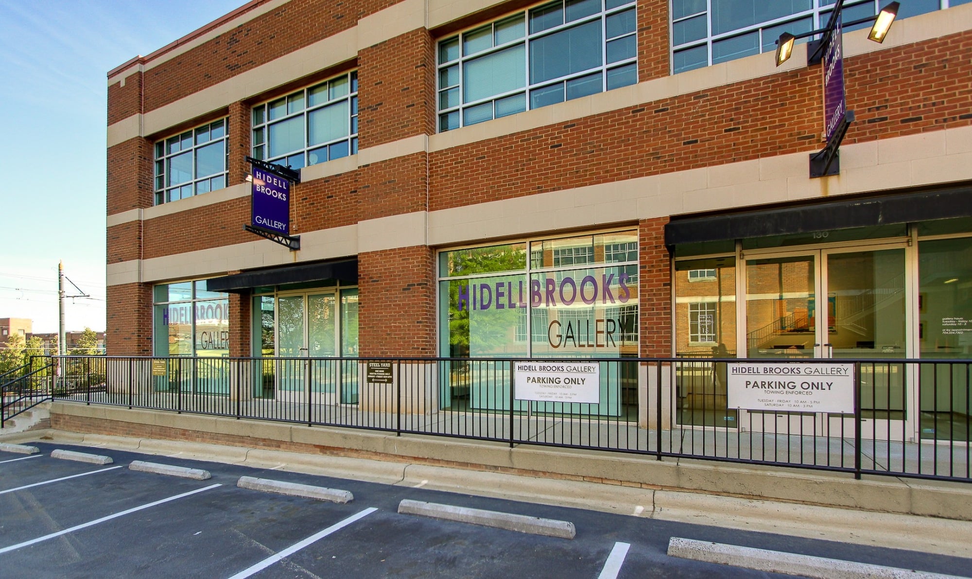hidell brooks gallery brick storefront and parking area after a commercial remodel in charlotte nc