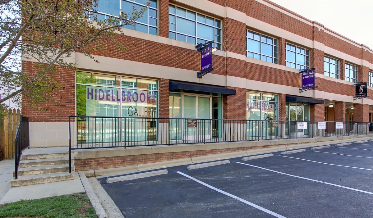 hidell brooks gallery exterior entrance and parking spaces after a commercial remodel in charlotte nc
