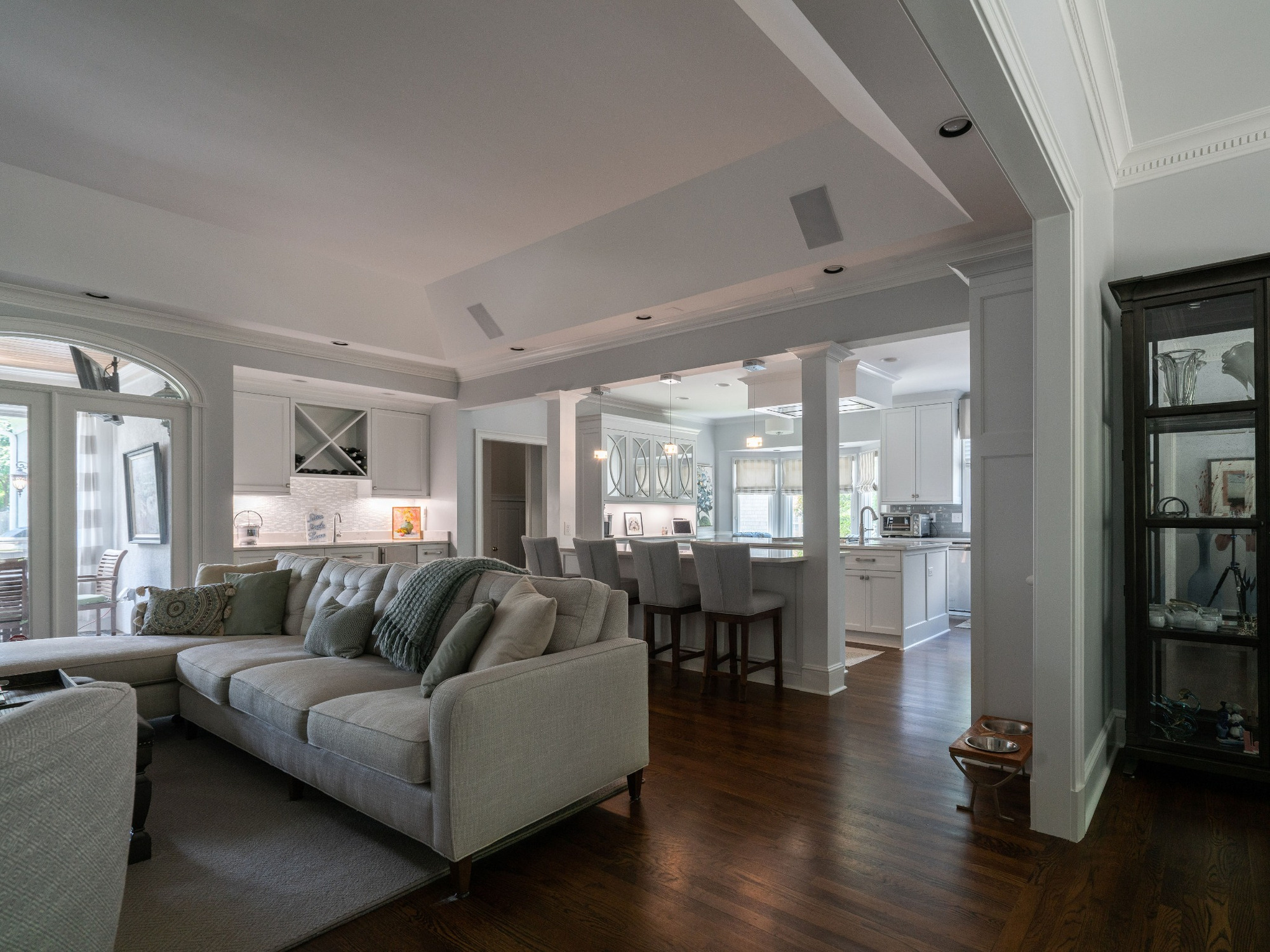 open concept living room and white kitchen in charlotte nc first floor remodel