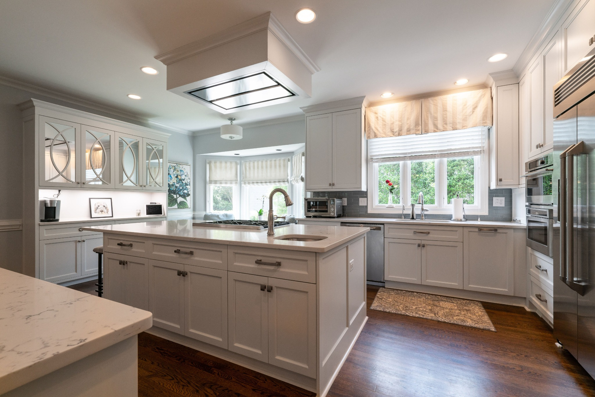 white shaker kitchen with large island in charlotte nc first floor remodel