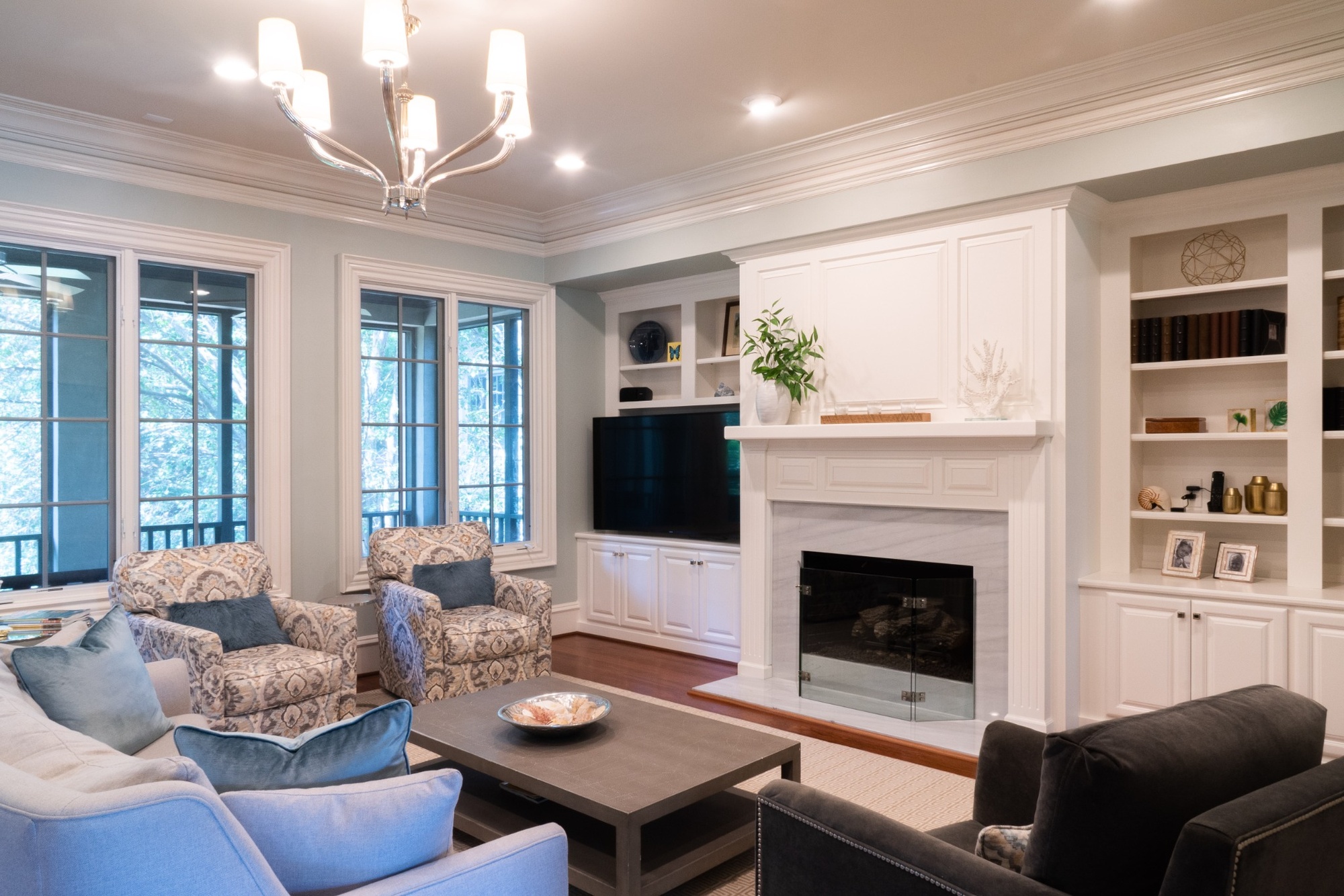 whole home remodel living room with custom fireplace wall and open shelving in charlotte nc