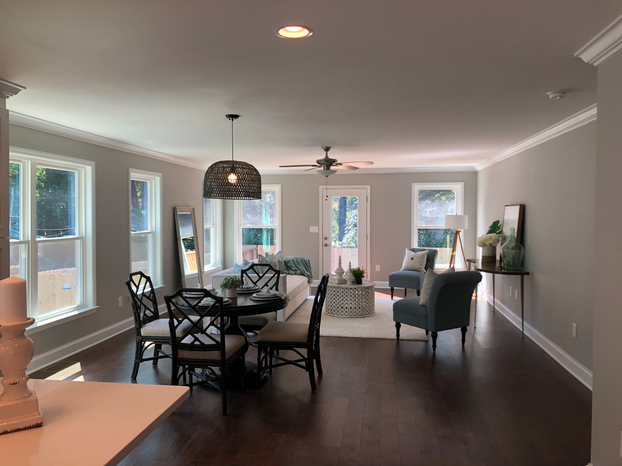 open living and dining area with blue accent chairs in charlotte nc addition