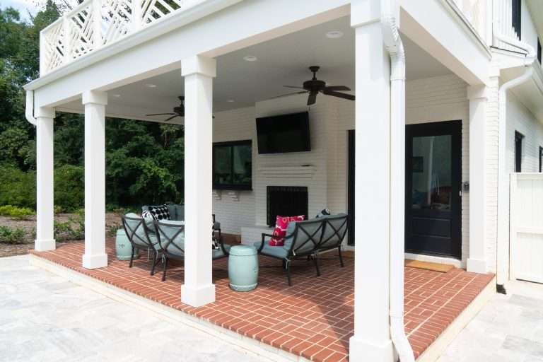 New home construction porch with fireplace done by 7 Acre construction